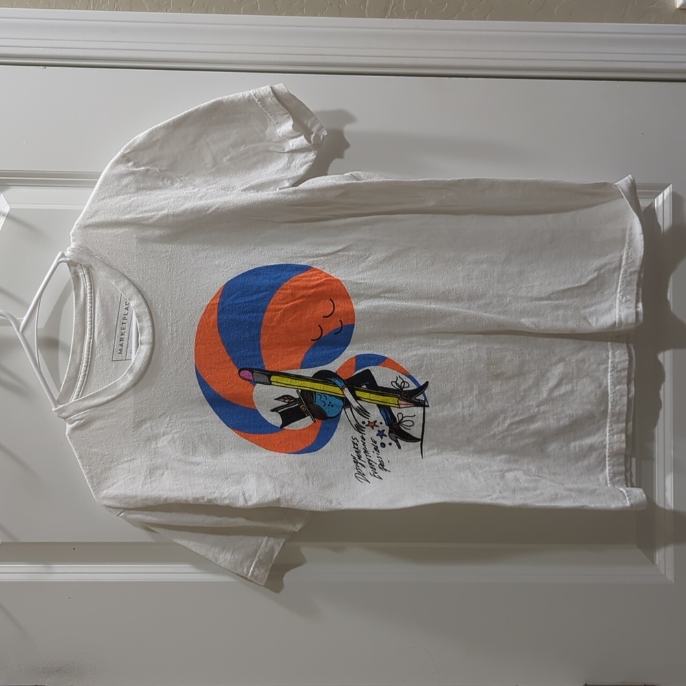 White "design makes everything possible" shirt